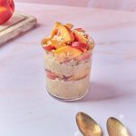 Vanilla Peach Overnight Oats in a glass