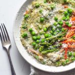 This Slow Cooker Chicken recipe features quinoa, spring vegetables, and tender chicken breast for a light but hearty weeknight dinner.